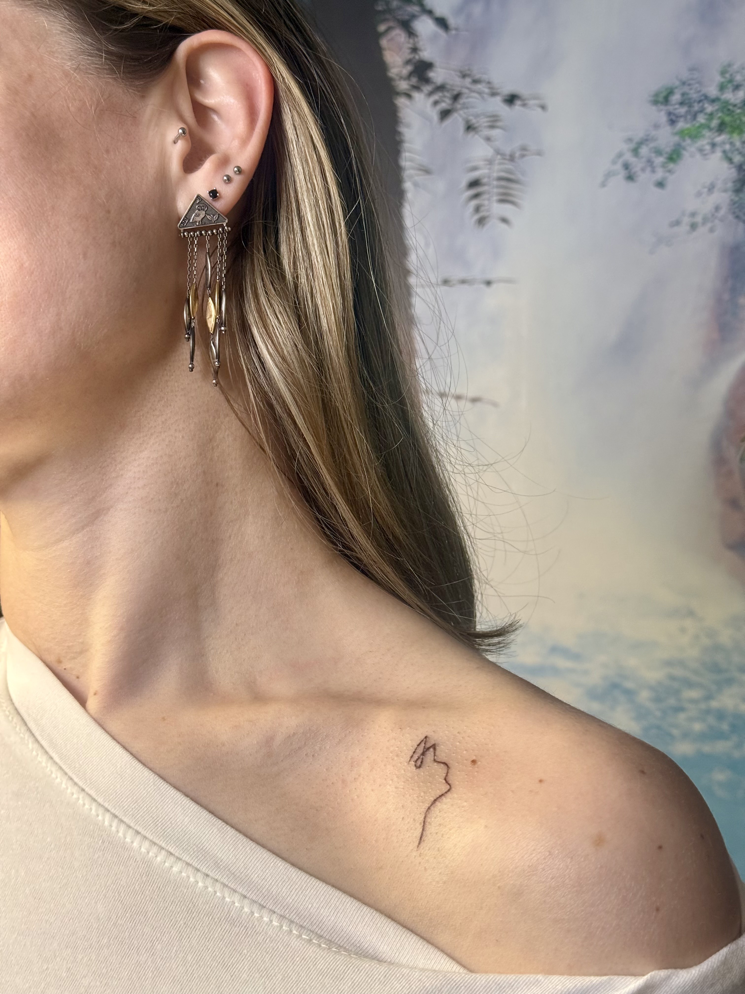 Fine line tattoo