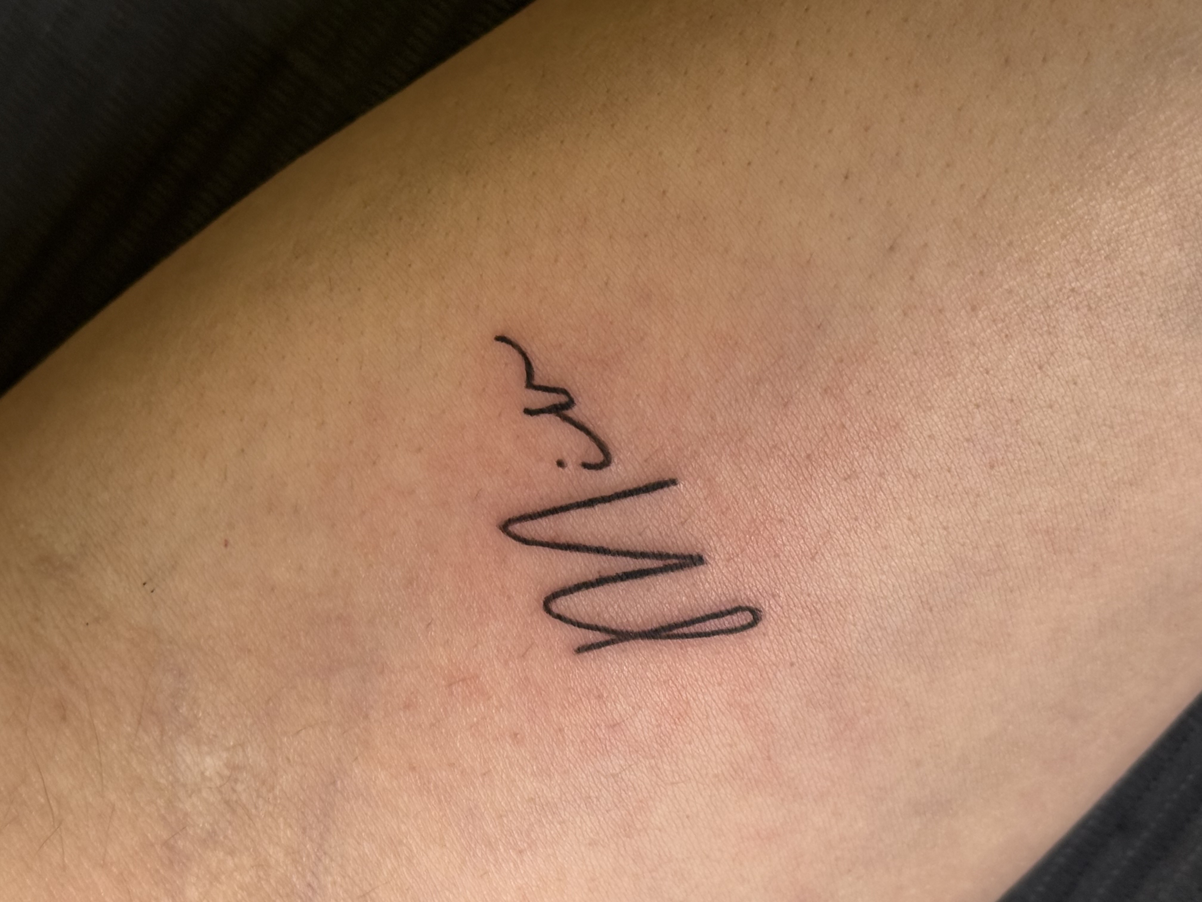 Fine line tattoo